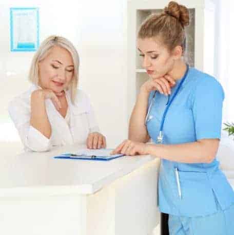 Health information specialists working in a medical office