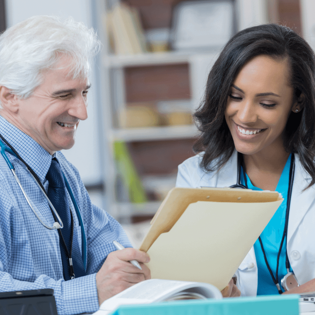 medical billing and coding specialist working with a doctor